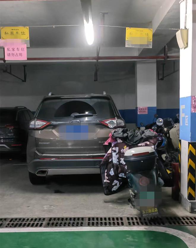 晨意帮忙丨车位被电动车阻挡出入难，业主称“物业敷衍不解决”，回应：保证不影响通行